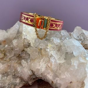 ❤️COACH ❤️red and gold bangle bracelet with chain. Classic ‘C’ emblem .